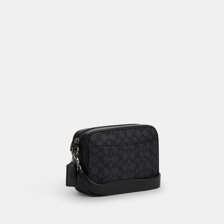 กระเป๋าสะพายข้างผู้ชาย รุ่น Warner Crossbody Bag In Signature Canvas
