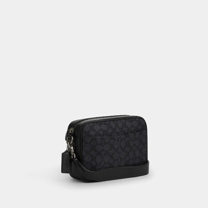 กระเป๋าสะพายข้างผู้ชาย รุ่น Warner Crossbody Bag In Signature Canvas
