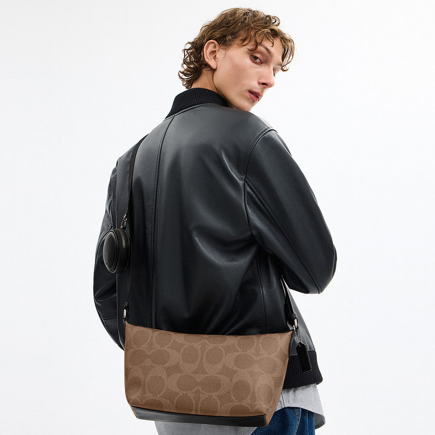 กระเป๋าสะพายข้างผู้ชาย รุ่น Small Finn Crossbody Bag With Pouch In Maxi Signature Canvas
