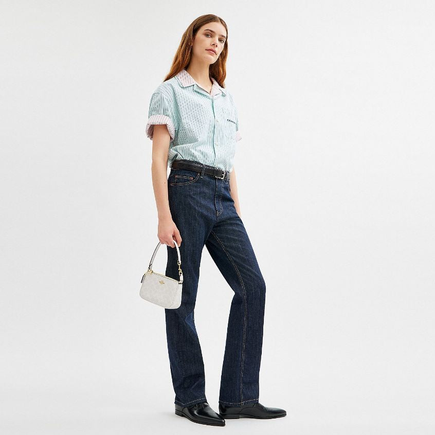 กระเป๋าคล้องมือผู้หญิง รุ่น Nolita 19 In Signature Canvas