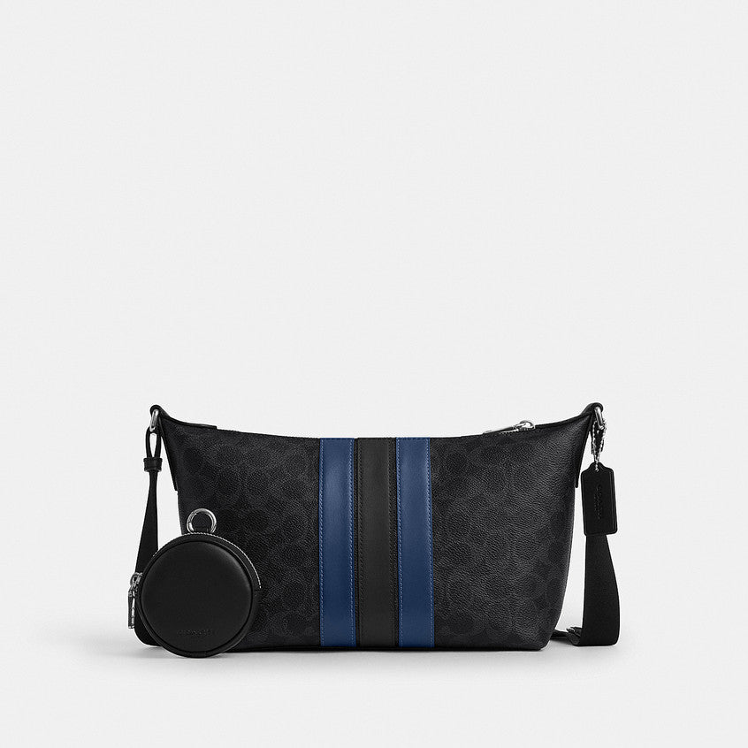 กระเป๋าสะพายข้างผู้ชาย รุ่น Small Finn Crossbody with Pouch in Signature Canvas with Varsity Stripe